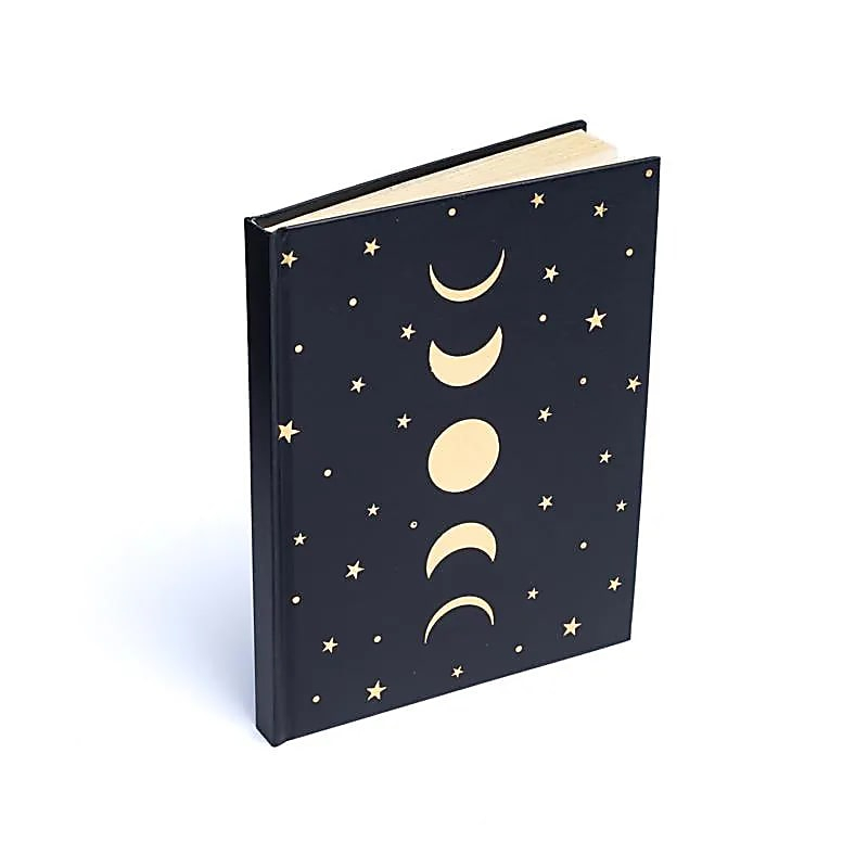 Notebook - black with phases of the Moon and stars (15 × 21 cm)